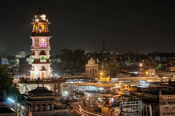 Explore Jodhpur with the Best Cab Service The bustling Sardar Market with the iconic Clock Tower in the background, filled with vibrant stalls and local shoppers.