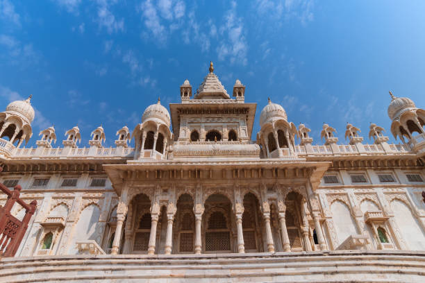 The serene marble cenotaph of Jaswant Thada surrounded by lush gardens and blue sky Explore Jodhpur with the Best Cab Service.