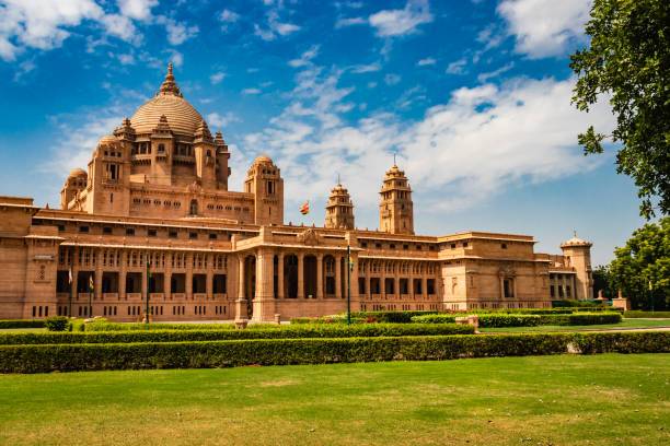 Explore Jodhpur with the Best Cab Service The grand Umaid Bhawan Palace, a blend of Indian and European architectural styles, surrounded by manicured gardens.