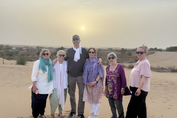 Tourists enjoying a desert experience in Jaisalmer with Jodhpur to Jaisalmer Cab Service