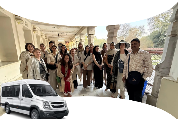 A modern taxi driving on a scenic highway road from Jodhpur to another city, with a sunset and desert landscape in the background.