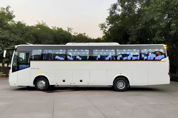Luxury air-suspension coach bus by JCS Cab & Car Rental Service for large group tours, corporate travel, weddings, and educational trips across Rajasthan.