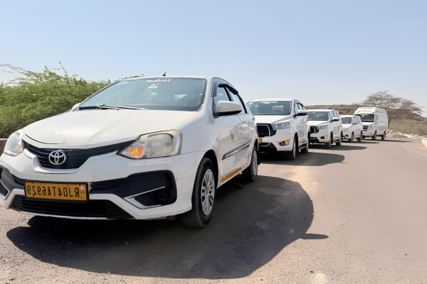 Fleet of white Toyota Etios sedans by JCS Cab & Car Rental Service in Jodhpur, offering affordable taxi services for local sightseeing, airport transfers, railway station pickups, business travel, and outstation trips across Rajasthan.
