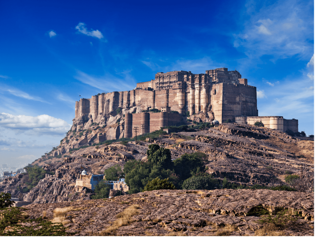 Mehrangarh Fort standing tall on a hill with massive walls and intricate architecture Taxi Service in Jodhpur.