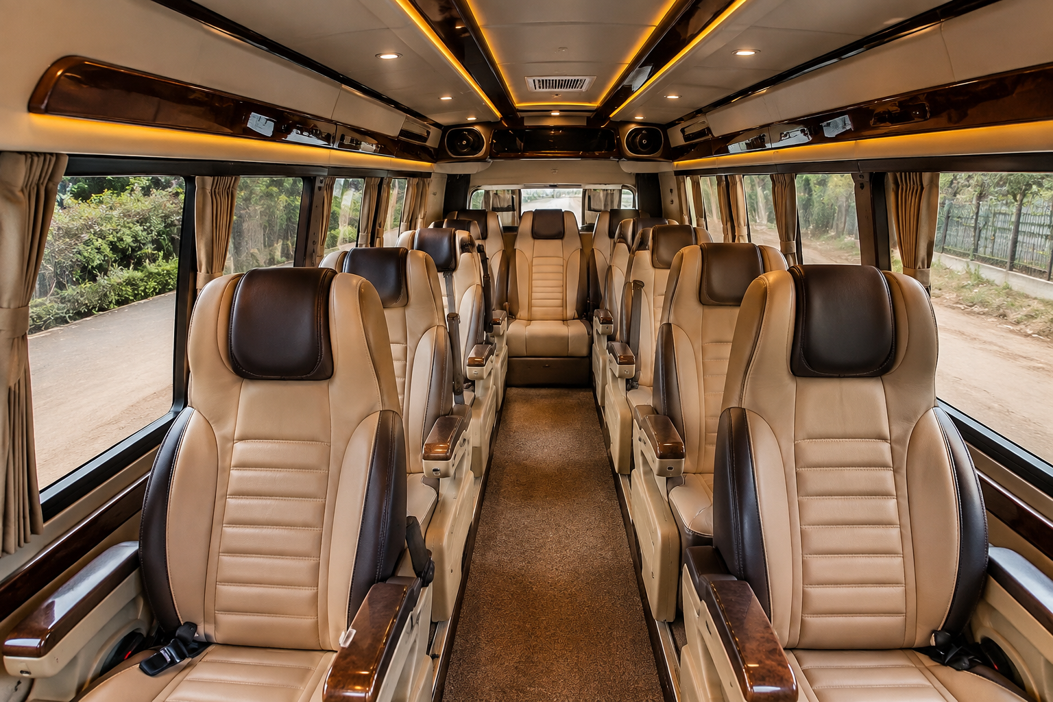 Luxury Maharaja Tempo Traveller interior with premium seating.