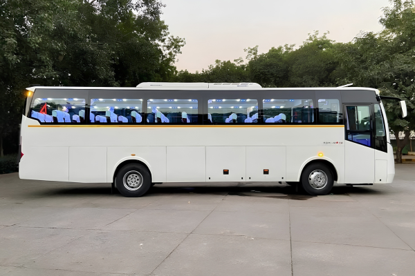 White luxury passenger coach bus for group tours and long-distance travel.